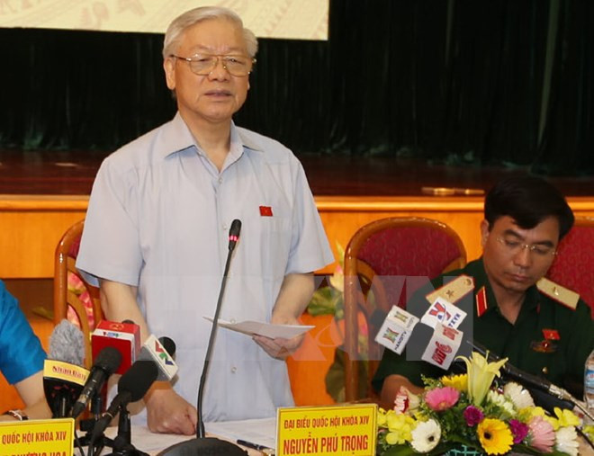 越共中央总书记阮富仲与河内市选民接触 ảnh 1 越共中央总书记阮富仲与河内市选民接触 ảnh 1