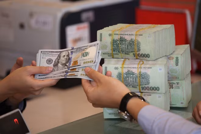  4月28日越盾对美元汇率中间价下调10越盾 ảnh 1