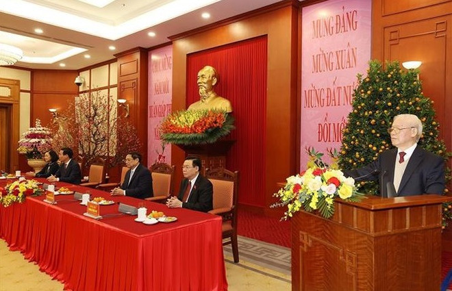 越共中央总书记阮富仲向党和国家领导、前领导人拜年 ảnh 2