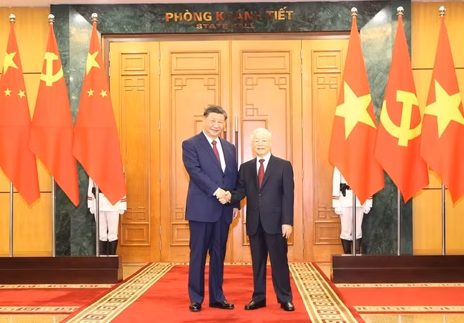 越共中央总书记阮富仲与中共中央总书记、中国国家主席习近平互致新春贺信 ảnh 1