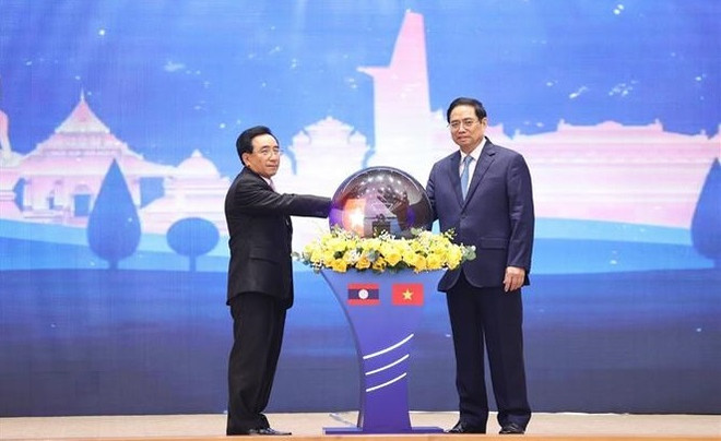 范明政与老挝政府总理潘坎·维帕万共同主持2022年越老团结友好年启动仪式 ảnh 3 范明政与老挝政府总理潘坎·维帕万共同主持2022年越老团结友好年启动仪式 ảnh 3