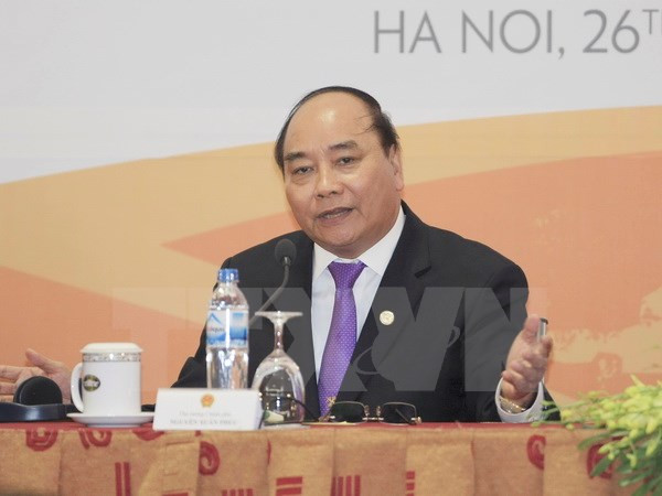 越南政府总理阮春福在河内举行国际新闻发布会 ảnh 1 越南政府总理阮春福在河内举行国际新闻发布会 ảnh 1