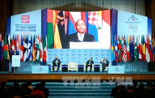 越南政府总理阮春福出席第15届亚欧工商论坛 ảnh 1 越南政府总理阮春福出席第15届亚欧工商论坛 ảnh 1