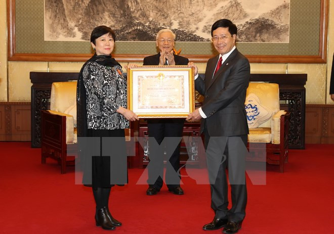 越共中央总书记阮富仲会见中国人民对外友好协会代表团 ảnh 1