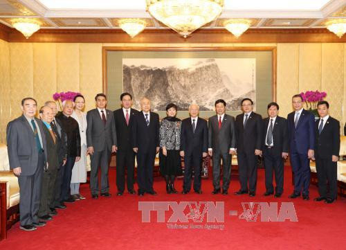 越共中央总书记阮富仲会见中国人民对外友好协会代表团 ảnh 3