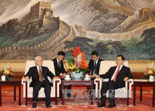 越共中央总书记阮富仲会见中国全国人大常委会委员长张德江 ảnh 1 越共中央总书记阮富仲会见中国全国人大常委会委员长张德江 ảnh 1