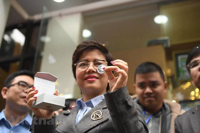 美朝领导人第二次会晤纪念硬币正式发行 ảnh 2