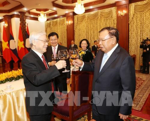 越老联合声明:两国永远在民族独立和社会主义道路上携手前行 ảnh 2 越老联合声明:两国永远在民族独立和社会主义道路上携手前行 ảnh 2