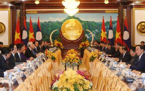 越老联合声明:两国永远在民族独立和社会主义道路上携手前行 ảnh 1 越老联合声明:两国永远在民族独立和社会主义道路上携手前行 ảnh 1