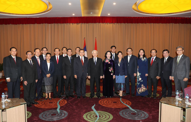 越共中央总书记、国家主席阮富仲会见老挝建国阵线中央委员会代表团 ảnh 3 越共中央总书记、国家主席阮富仲会见老挝建国阵线中央委员会代表团 ảnh 3