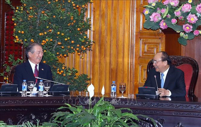 越南政府总理阮春福会见日本与湄公河经济合作委员会主席 ảnh 1 越南政府总理阮春福会见日本与湄公河经济合作委员会主席 ảnh 1