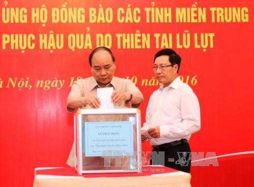 越南政府办公厅为中部灾民筹集善款 ảnh 2 越南政府办公厅为中部灾民筹集善款 ảnh 2