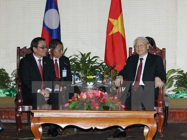 越共中央总书记阮富仲会见老挝建国阵线中央委员会主席赛宋蓬•丰威汉 ảnh 2 越共中央总书记阮富仲会见老挝建国阵线中央委员会主席赛宋蓬•丰威汉 ảnh 2