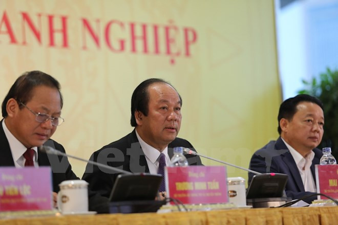 越南政府发言人梅进勇：为企业排忧解难是政府的重要责任 ảnh 1