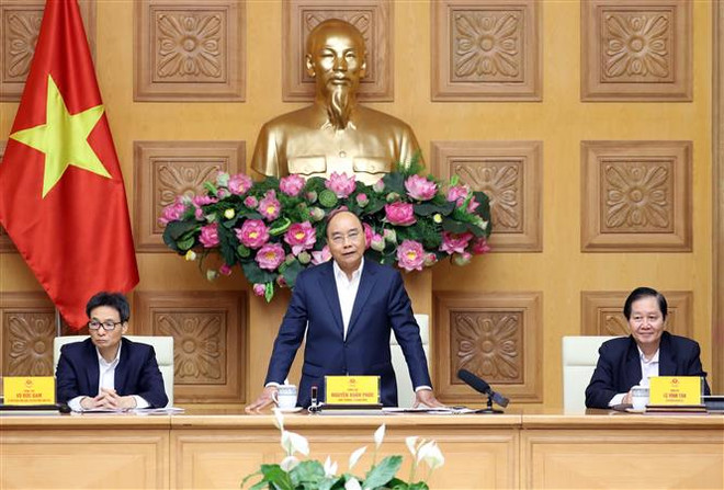 政府总理阮春福主持召开中央工资制度改革指导委员会会议 ảnh 1