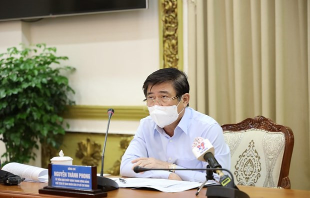 胡志明市因确诊病例持续增加而进一步加强工业园区中的防疫工作 ảnh 1 胡志明市因确诊病例持续增加而进一步加强工业园区中的防疫工作 ảnh 1