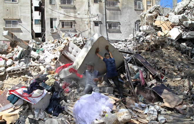 造访慰问遭受以色列-巴勒斯坦战事影响的越南研修生 ảnh 1