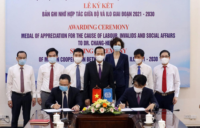 越南与ILO签署2021-2030年促进国际劳工标准在越实施的合作备忘录 ảnh 1 越南与ILO签署2021-2030年促进国际劳工标准在越实施的合作备忘录 ảnh 1