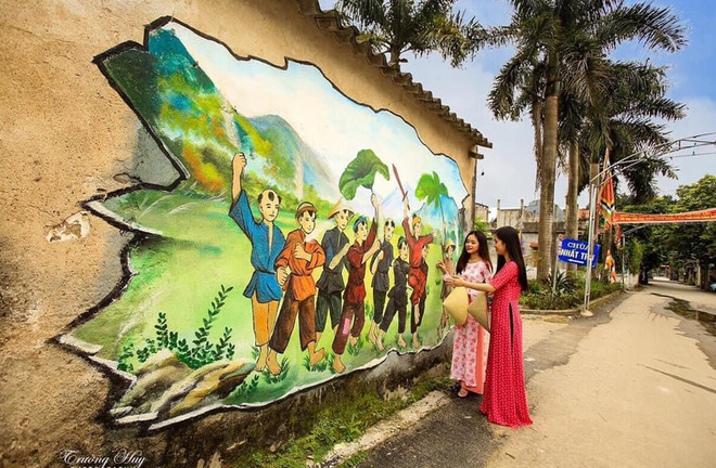 生动逼真的墙绘艺术使宁平省村容村貌焕然一新 ảnh 1