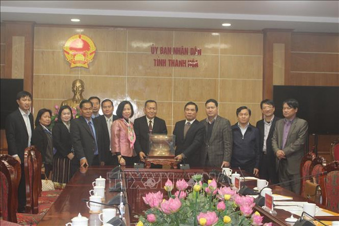 老挝巴特寮通讯社高级工作代表团走访越南清化省 ảnh 2