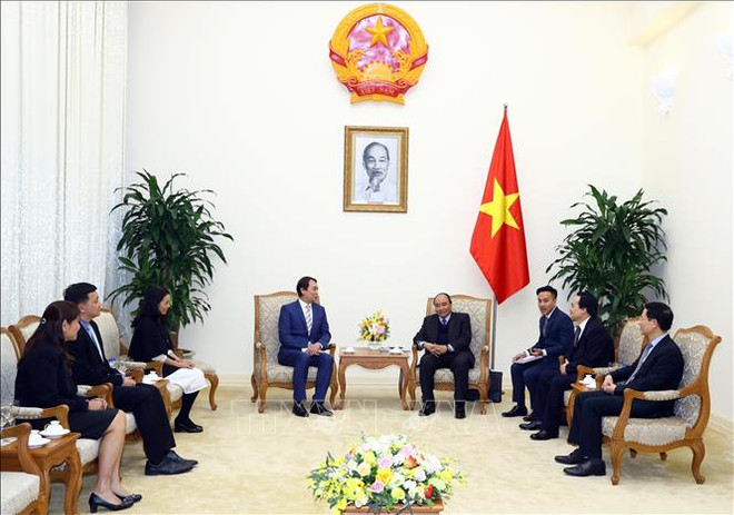 阮春福会见新加坡制造商总会会长符标雄 ảnh 1