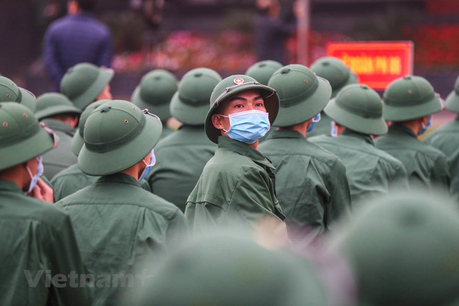 组图:首都河内新兵带着口罩奔赴军营 ảnh 6 组图:首都河内新兵带着口罩奔赴军营 ảnh 6