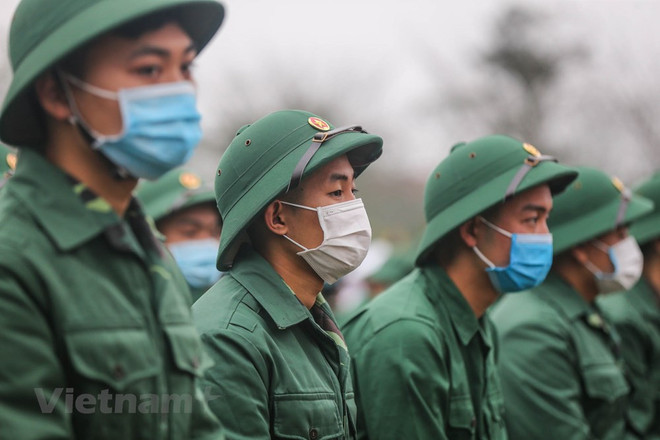 组图:首都河内新兵带着口罩奔赴军营 ảnh 5 组图:首都河内新兵带着口罩奔赴军营 ảnh 5