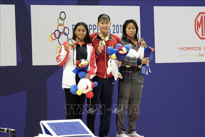 第30届东南亚运动会：阮氏映圆斩获女子200米个人混合泳金牌 ảnh 1