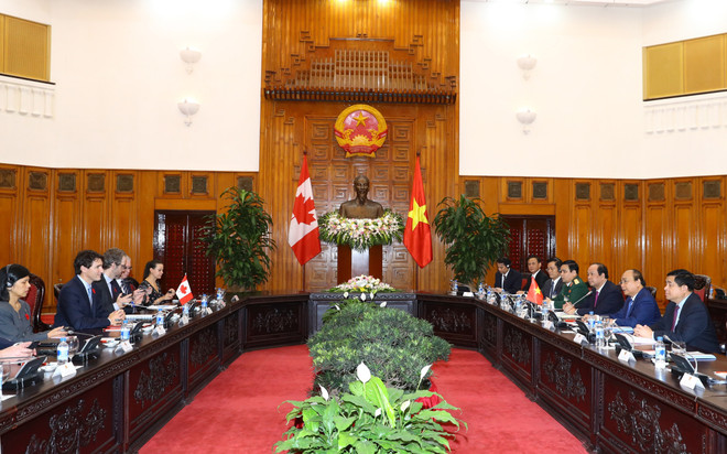 越南和加拿大发表关于确立全面伙伴关系的联合声明 ảnh 1