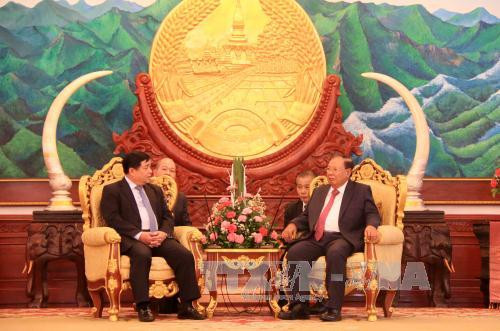 老挝人民革命党中央总书记、国家主席会见越南计划投资部代表团 ảnh 1 老挝人民革命党中央总书记、国家主席会见越南计划投资部代表团 ảnh 1