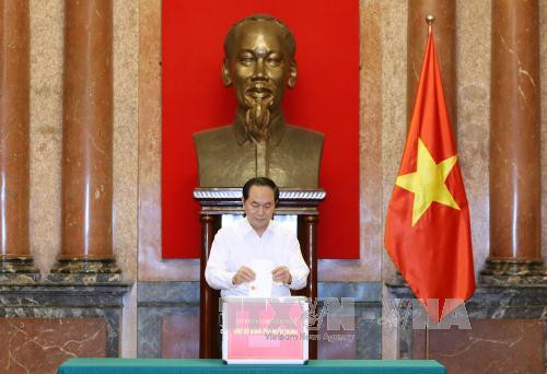 越南国家主席办公厅为中部以南灾区灾民筹集善款 ảnh 1