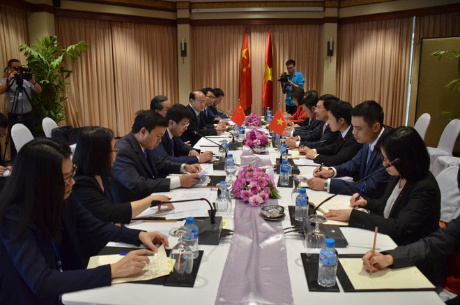 越南政府副总理兼外长范平明会见中国外长王毅和老挝外长沙伦塞 ảnh 2 越南政府副总理兼外长范平明会见中国外长王毅和老挝外长沙伦塞 ảnh 2