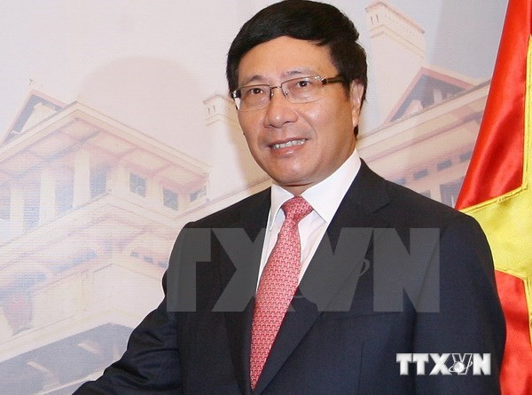 越南政府副总理兼外长范平明对老挝进行正式访问 ảnh 1 越南政府副总理兼外长范平明对老挝进行正式访问 ảnh 1