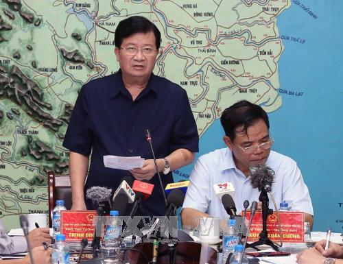 政府副总理郑廷勇：坚决确保每一个受灾群众不挨饿受冻和防止疾病发生 ảnh 1