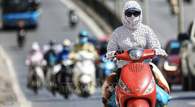 越南中部和北部特别炎热 局部气温超过40摄氏度 ảnh 1