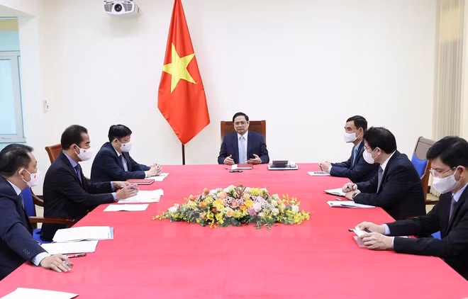 越南政府总理范明政与法国总理让·卡斯特克斯通电话 ảnh 1