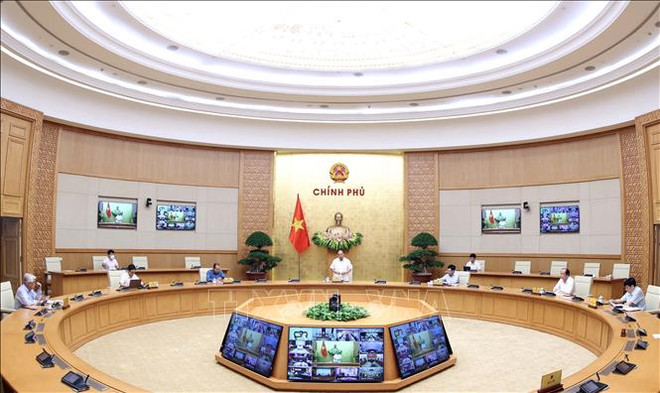 阮春福总理：在不同地方制定有关经济和卫生的有效防疫战略 ảnh 1