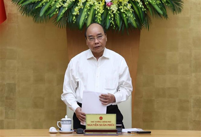 阮春福总理主持召开政府立法工作专题会议 ảnh 1