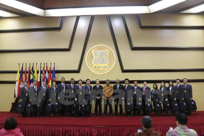 越南参加在印度尼西亚举办的东盟自然灾害应急救助培训班 ảnh 1