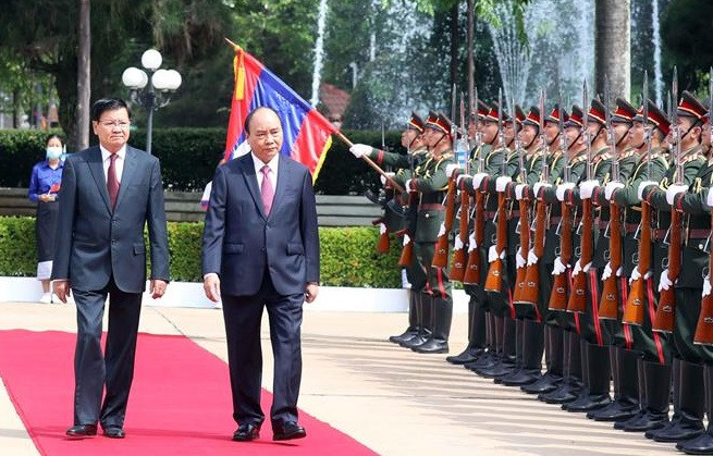 老挝媒体重点报道越南国家主席阮春福访老之旅 ảnh 2 老挝媒体重点报道越南国家主席阮春福访老之旅 ảnh 2