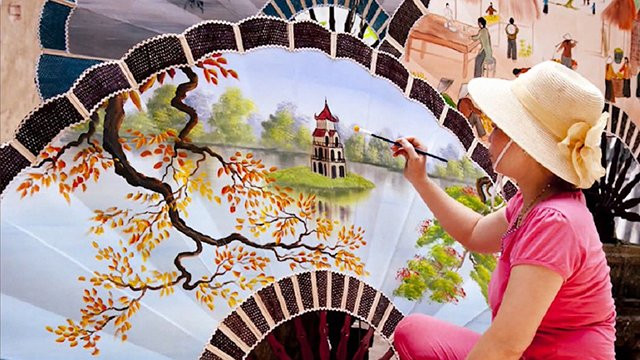 推崇越南妇女和传统工艺村之美 ảnh 2 推崇越南妇女和传统工艺村之美 ảnh 2