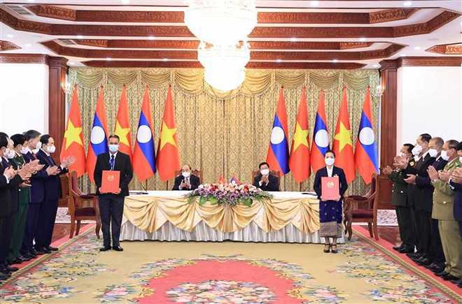 越南国家主席阮春福与老挝党中央总书记、国家主席通伦进行会谈 ảnh 2 越南国家主席阮春福与老挝党中央总书记、国家主席通伦进行会谈 ảnh 2