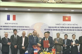 2025-2028年翰林院-法国国家科学研究中心行动计划签署仪式。图自越通社