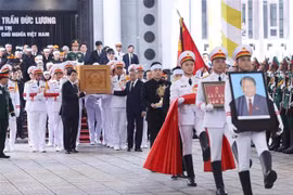 原越南国家主席陈德良追悼会隆重举行。图自越通社
