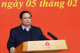 越南政府总理范明政发表讲话。图自越通社