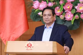 越南政府总理范明政发表讲话。图自越通社