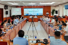 会议场景。图自越通社