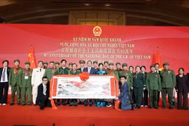 与会代表合影。图自越通社