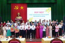 与会代表合影。图自越通社