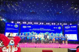 公布仪式现场。图自越通社